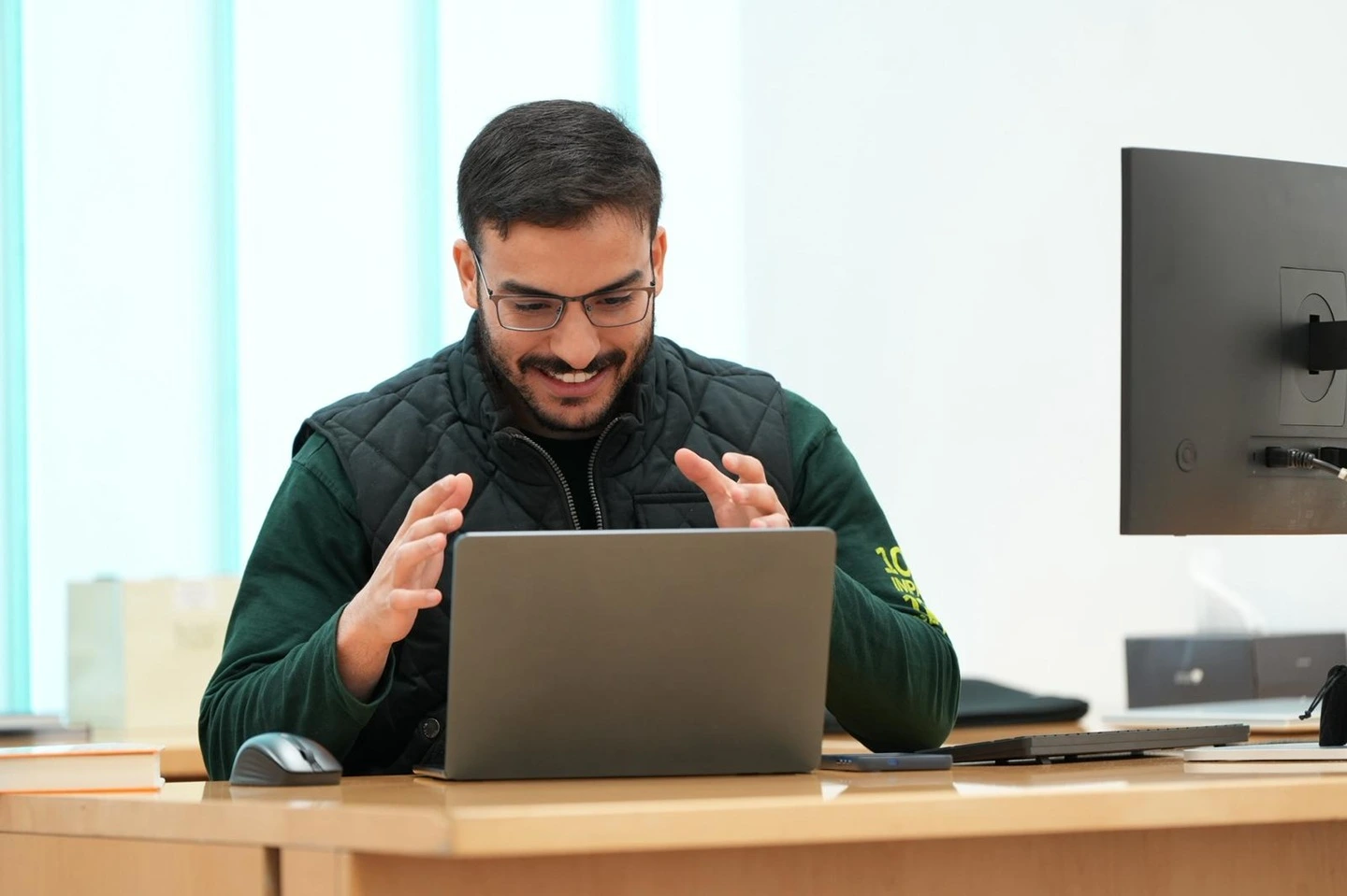 Yousef Omeish working at his laptop as part of QSTP's Tech Venture Fund